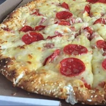 1 Pizza Grande con Queso crema en la Orilla