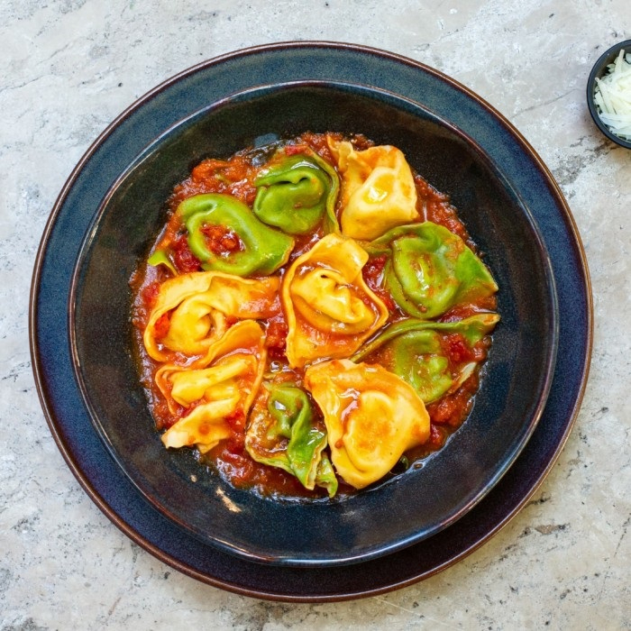 Com molho passata de tomates.