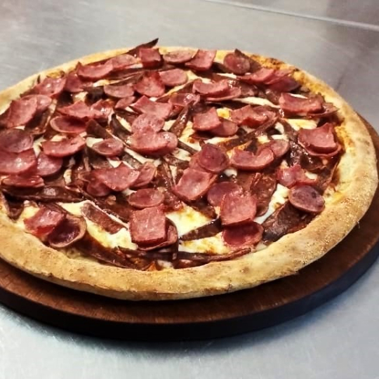 Pizza La de Mathi + Gaseosa