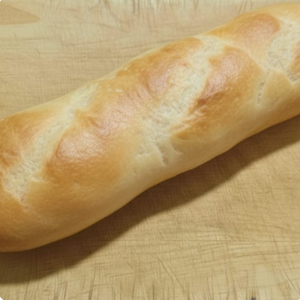 Uma unidade de pão artesanal de fermentação mista com casquinha crocante e miolo macio, perfeito para seu lanche. Aprox. 120g.