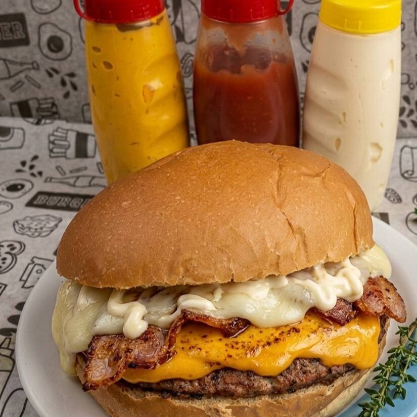 pão, hambúrguer simples, bacon, queijo, presunto ,maionese , cheddar