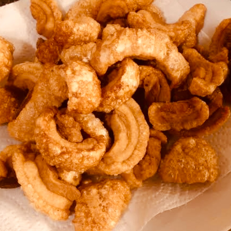 aproximadamente 250 gramas de torresmo