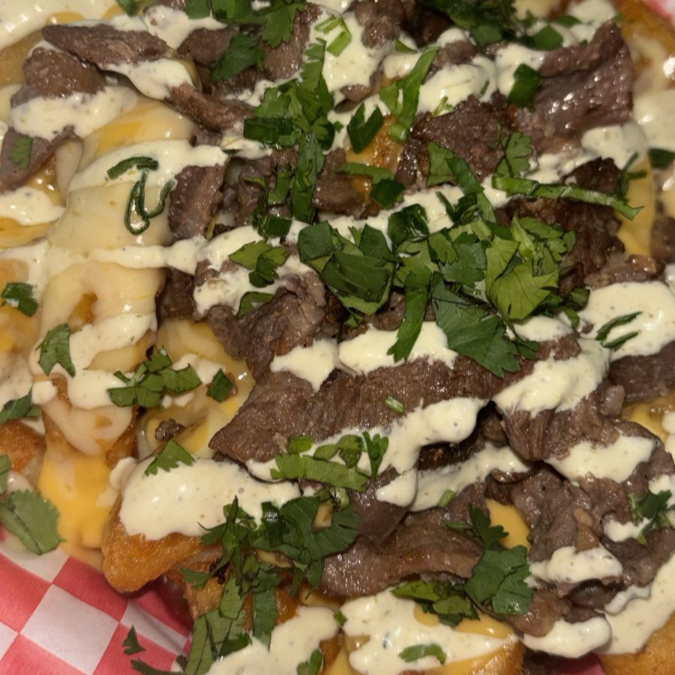 Papas con Carne Asada