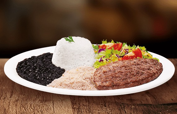 Nosso famoso steak bovino compactado (aprox. 120g), grelhado no ponto certo. Acompanhado com arroz, feijão fresquinho, farofa, salada e molho. Ideal para quem busca o sabor tradicional do Giraffas.