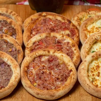 5 - Esfihas de Carne, 5 - Esfihas de Calabresa, 5 Esfihas de Muçarela, 1 - Coca Cola 1 litro, Ganhou 2 Esfihas de Chocoduo