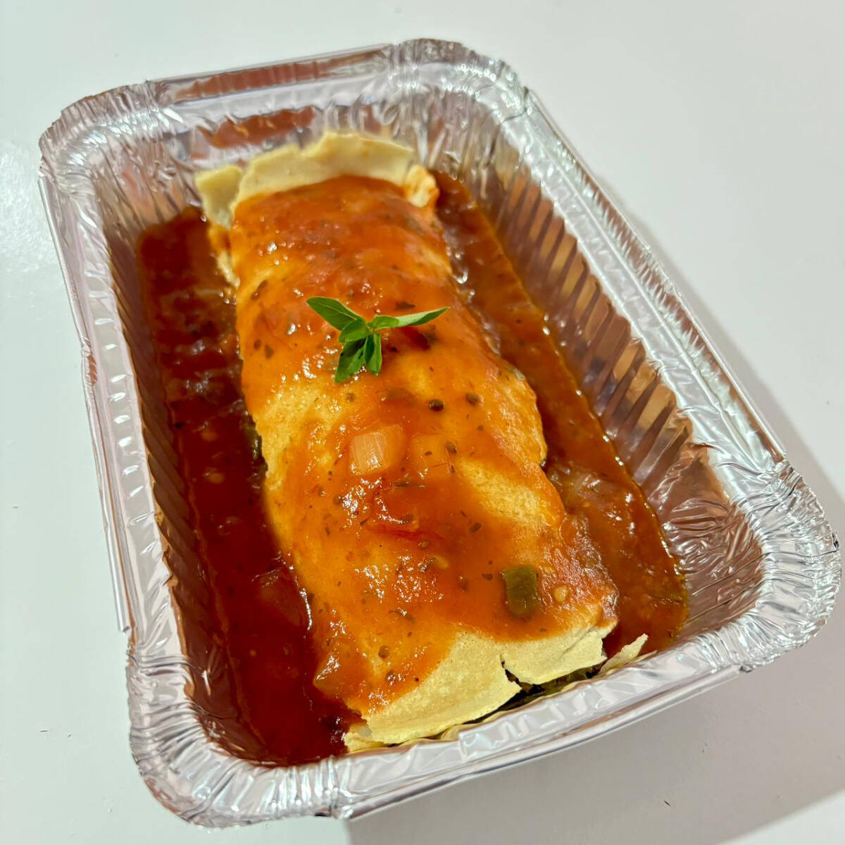 Carne moida (patinho), molho de tomate, queijo mussarela e orégano. 250g