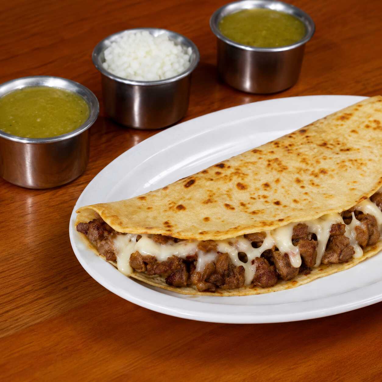 Carne Asada de Puerco con Quesillo