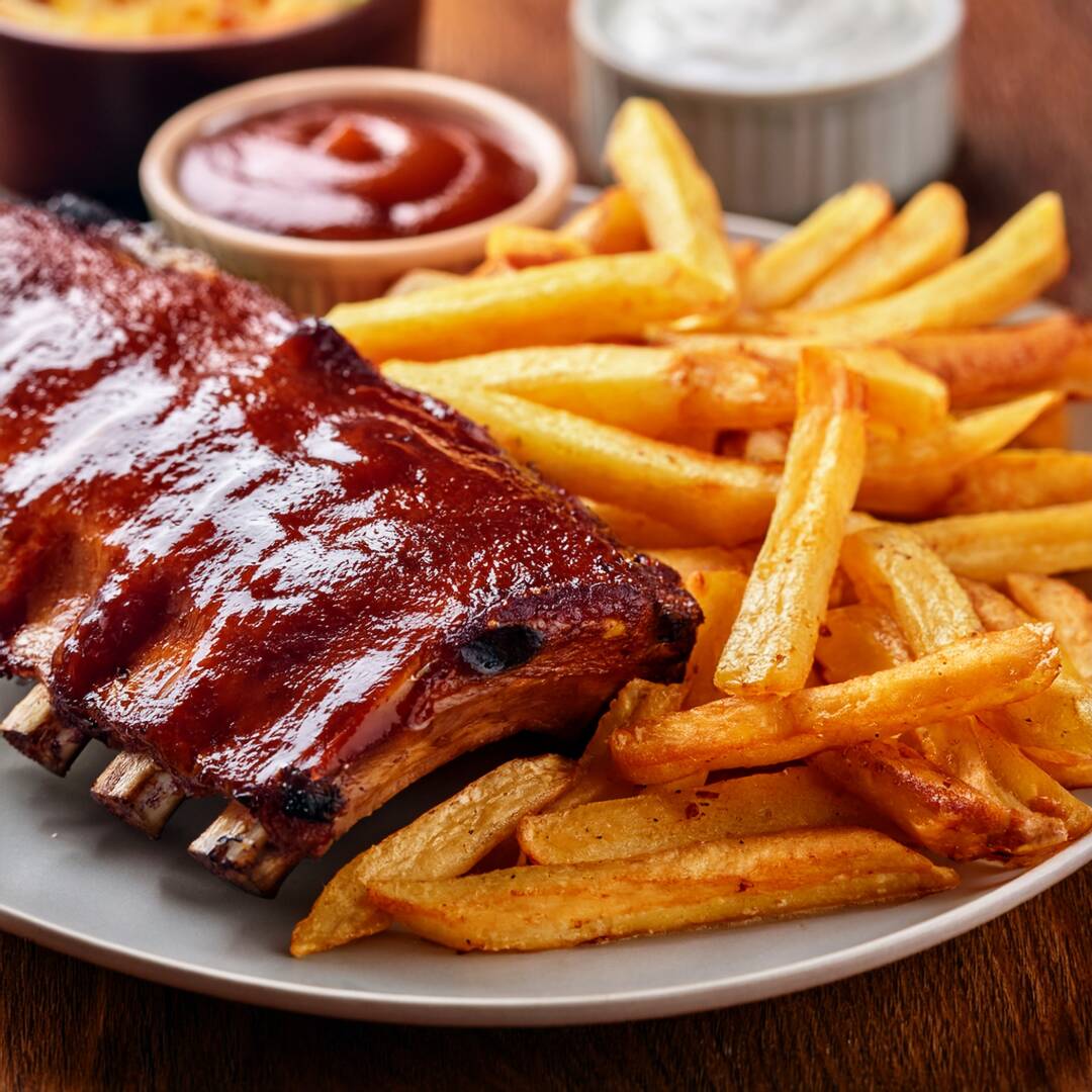 1 KG Costillas BBQ + 1/2kg Papas + Toppings +Ranch