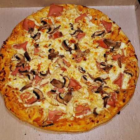 Pizza Carnes y Champiñón