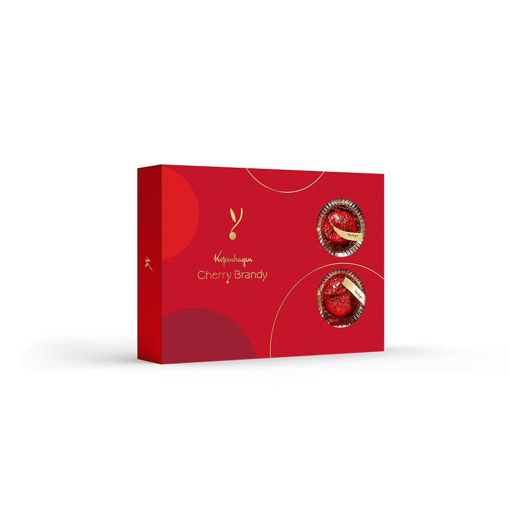Com o Cherry Brandy 190g, você conhece toda a qualidade que os chocolates Kopenhagen tem a oferecer. O Bombom é recheado com cereja macerada em calda de açúcar, vinho, canela e licor Cherry Brandy, além de ser coberto por duas camadas de fondant com licor, conhaque e chocolate ao leite. Experimente e se apaixone! Produto Alcoólico. Não recomendado para menores de 18