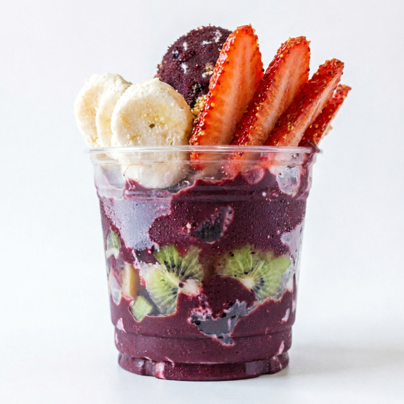 Copo 400 Ml de açaí puro ou acompanhado de complementos a escolher e caldas diversas. Você pode escolher cinco complementos e uma calda.