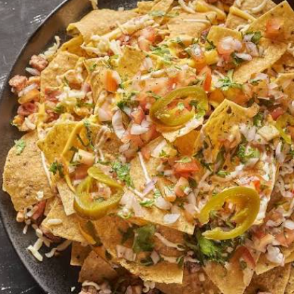 Nachos callejeros + te frio de la casa gratis