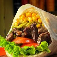 X-alcatra Pão de hamburguer, 100g de alcatra, alface tomate, uma fatia de presunto 3 de queijo, ketchup e maionese.