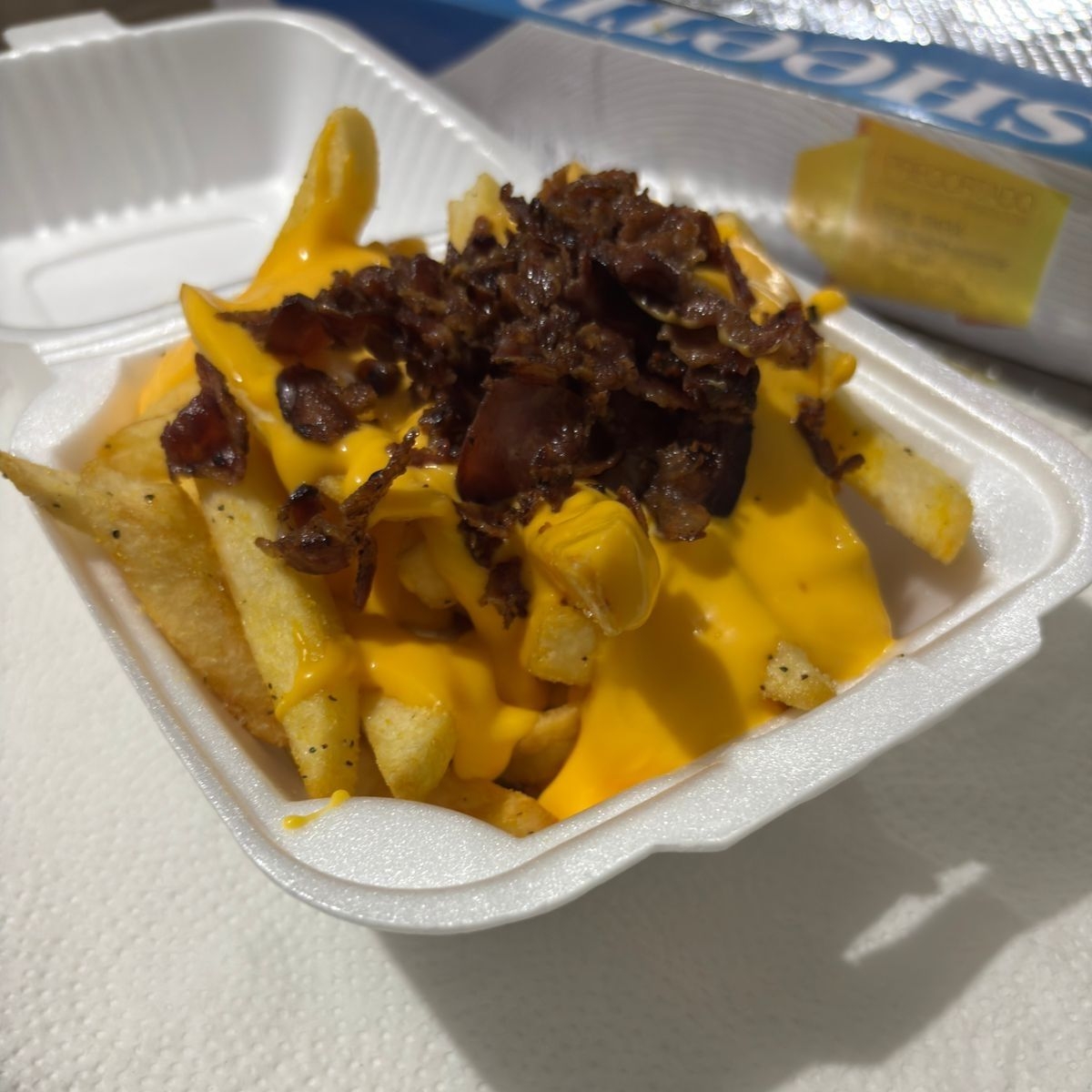 Papas con Queso y Tocino