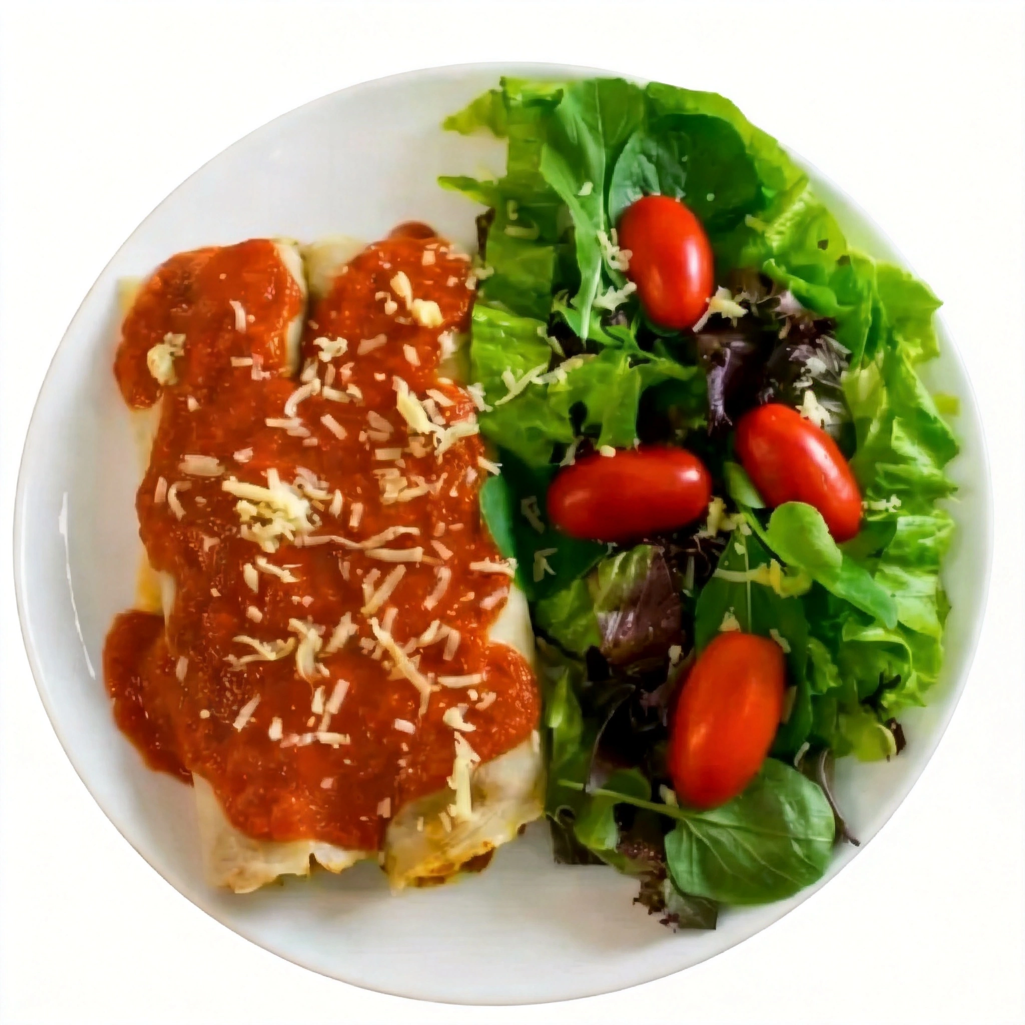 Deliciosa panqueca de carne ou frango com acompanhamento de salada(tomate e alface).