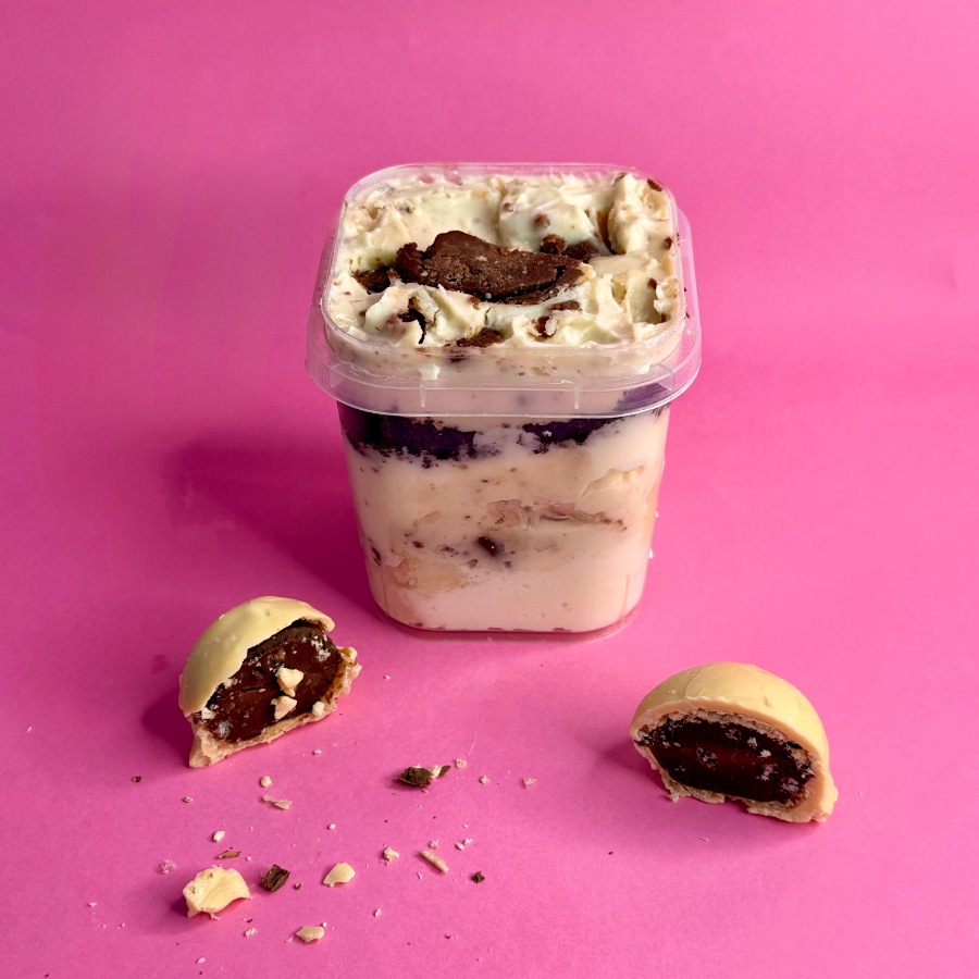 Pedaços de bombom ouro branco com ninho. 195gr