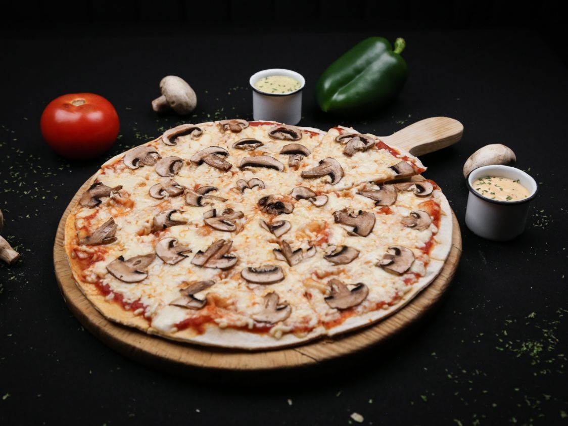 Pizza de Champiñones