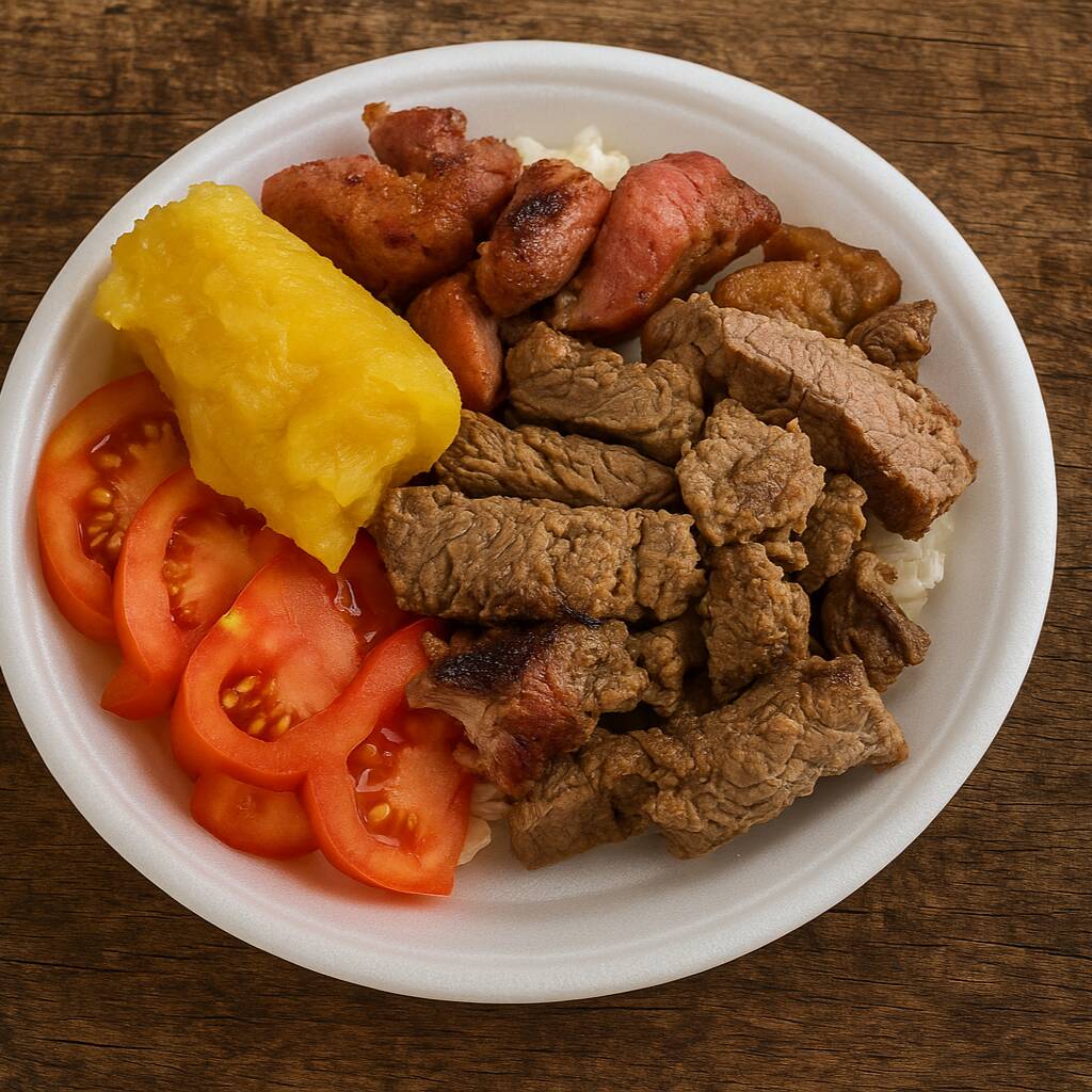 Arroz branco , feijão de caldo, legumes, macarrão, banana frita, mandioca cozida e churrasco. ACOMPANHA MIX DE SALADA Obs. : Na falta de um dos acompanhamentos será substituído por algum item do cardápio do dia.