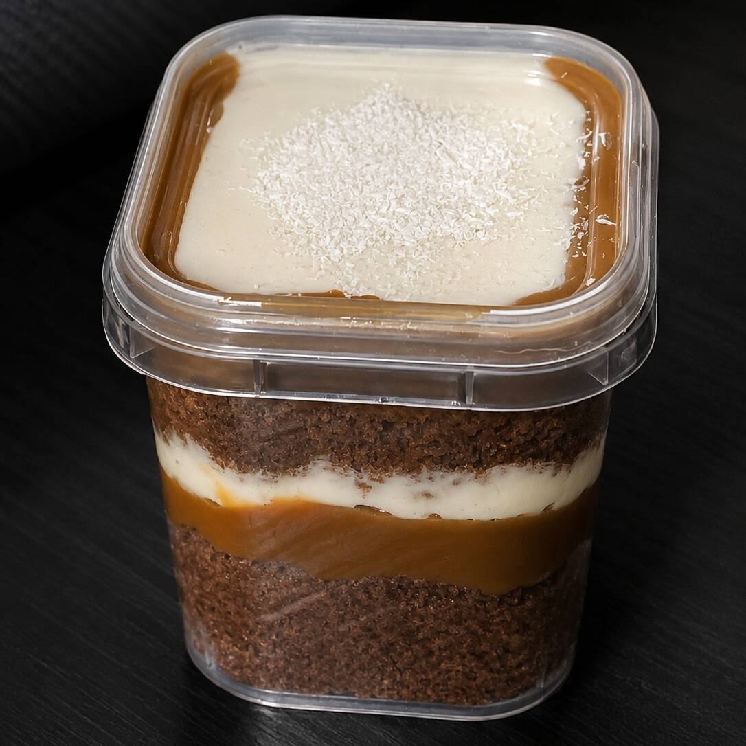 Bolo de chocolate, doce de leite, creme de ninho batido com coco.
(220ml)