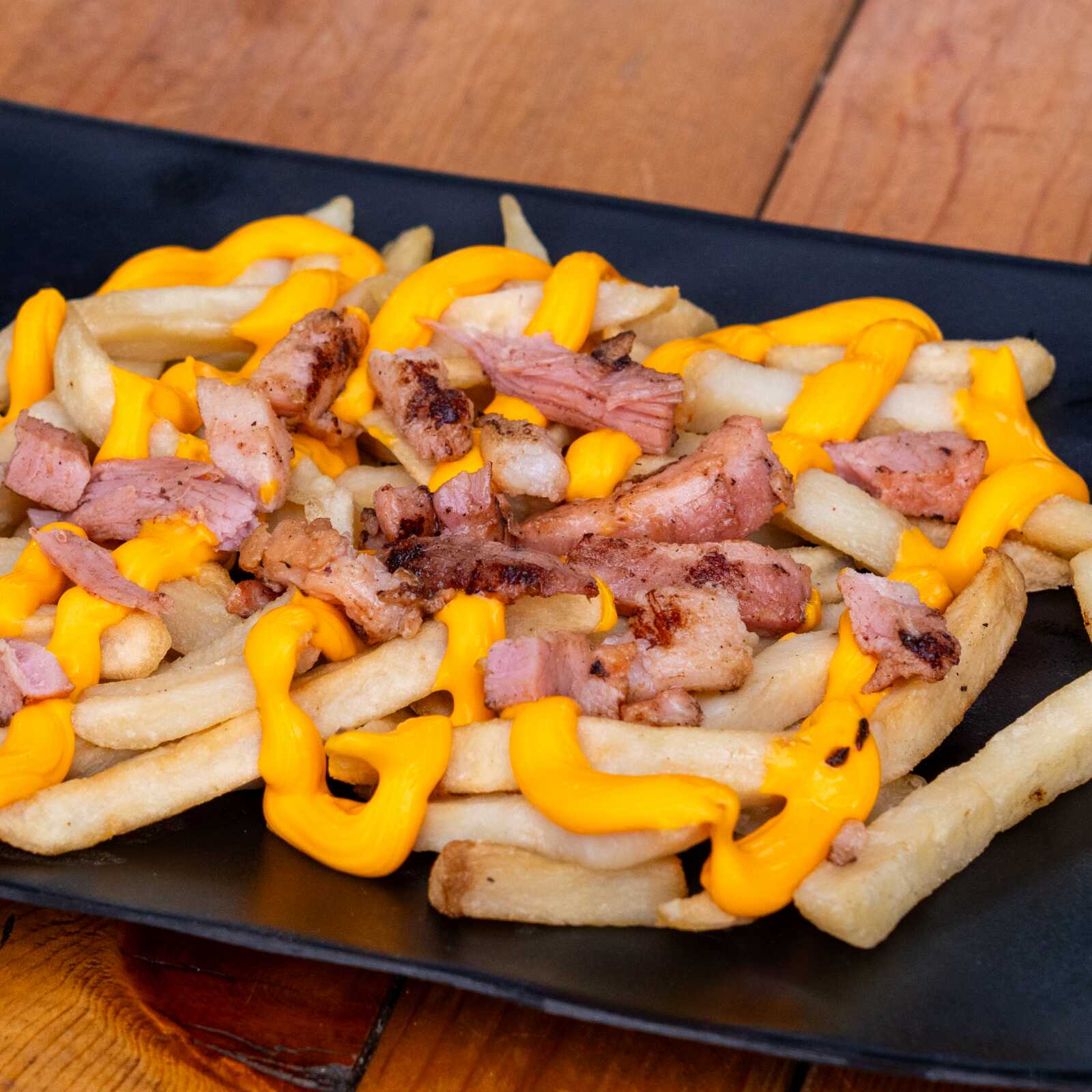 PAPAS FRITAS C/queso y Tocino