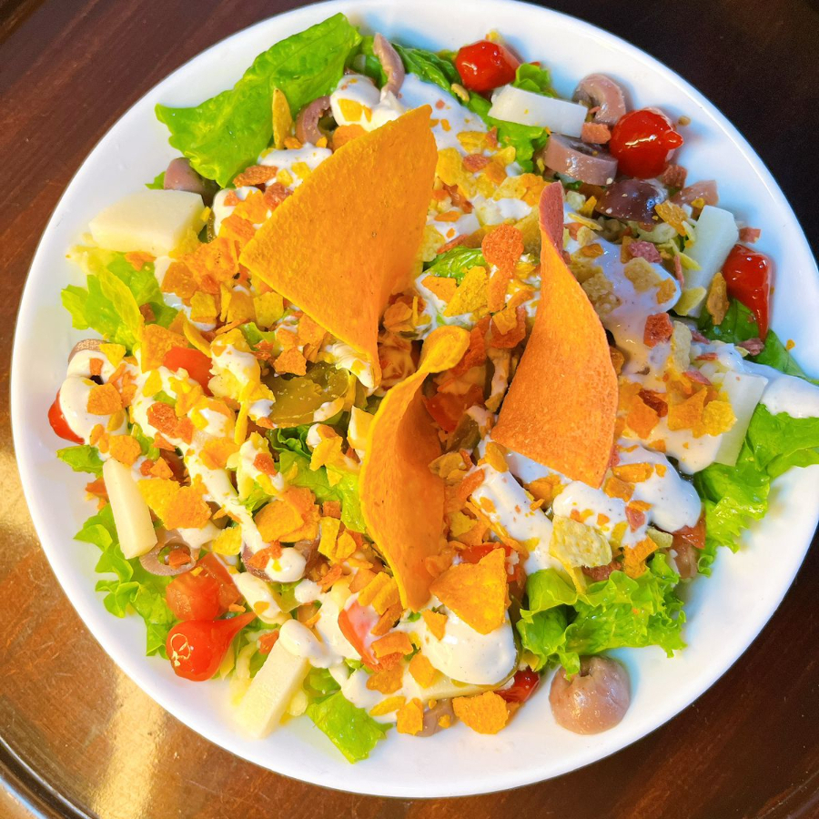 ALFACE, TOMATE, GUACAMOLE , QUEIJO MUÇARELA, SOUR CREAM, AZEITONA, PIMENTA BIQUINHO, JALAPEÑO, PALMITO E CROCANTE DE NACHOS