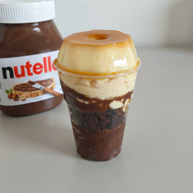 Feito com Brigadeiro de Chocolate cremoso, Brownie, Brigadeiro. Copo de 200mlde Ninho e Pudim de leite Condensado.