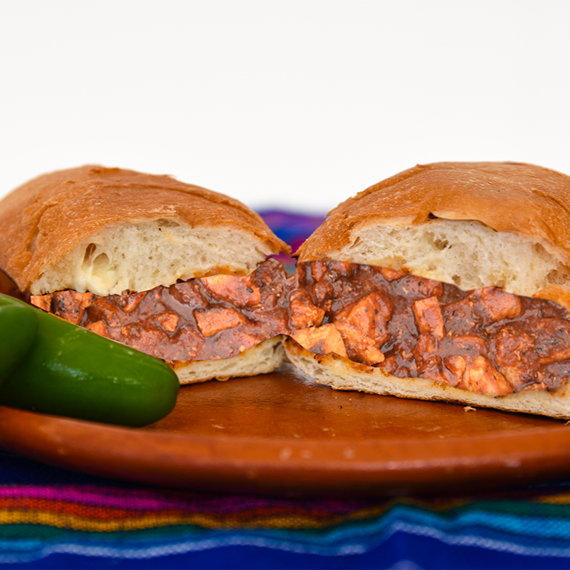 TORTA DE GUISADO PIERNA DE PUERCO EN CHILE COLORADO
