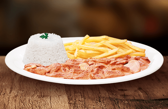 Iscas de carne bovina ( aprox. 120g in natura) mergulhadas no autêntico molho de estrogonofe Giraffas com champignons selecionados. Acompanha arroz soltinho e sua escolha de fritas ou purê.