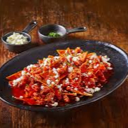 CHILAQUILES ROJOS + PAPAS FRITAS
