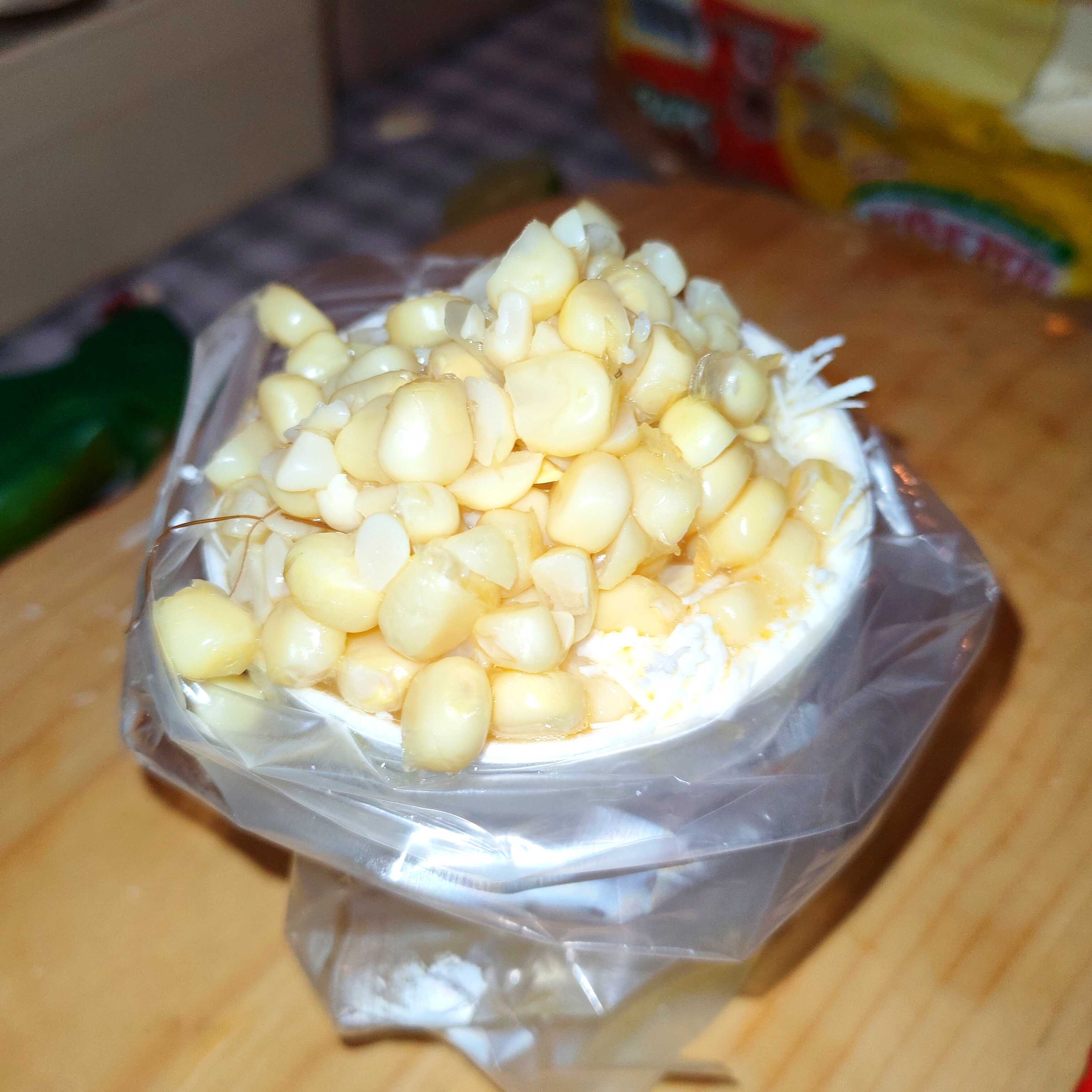 Vaso con elote blanco