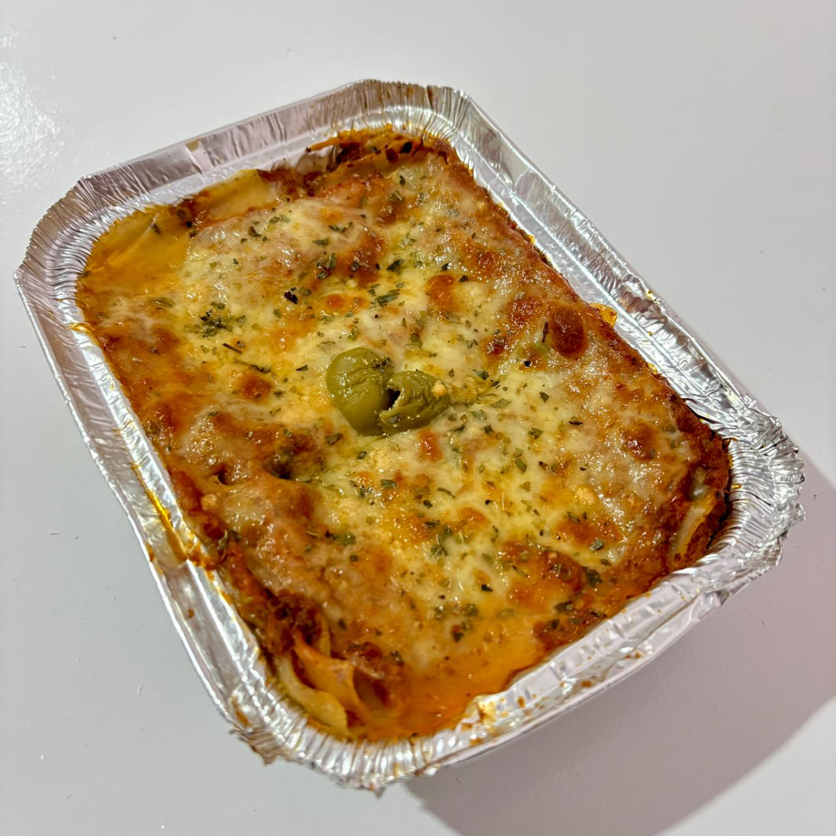 Carne moida (patinho), molho de tomate, queijo mussarela e orégano. 500g