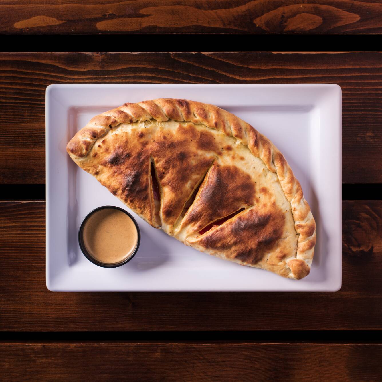 2 Calzone Hawaiano + Coca 1 Lt por $199