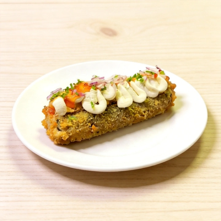 Base de Hot Filadélfia recheado com salmão fresco, sobreposto com cream cheese, geleia de pimenta, cebolinha e cebola roxa