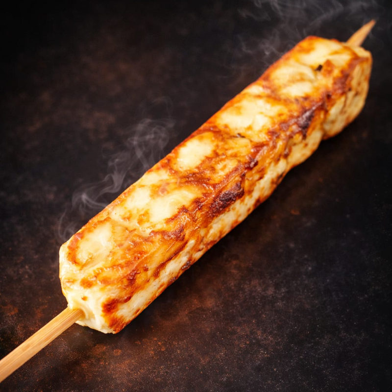 Queijo coalho dourado na brasa.