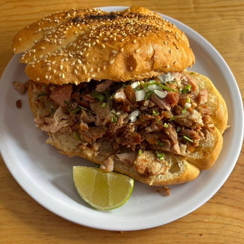 Torta de Carnitas con Queso Oaxaca