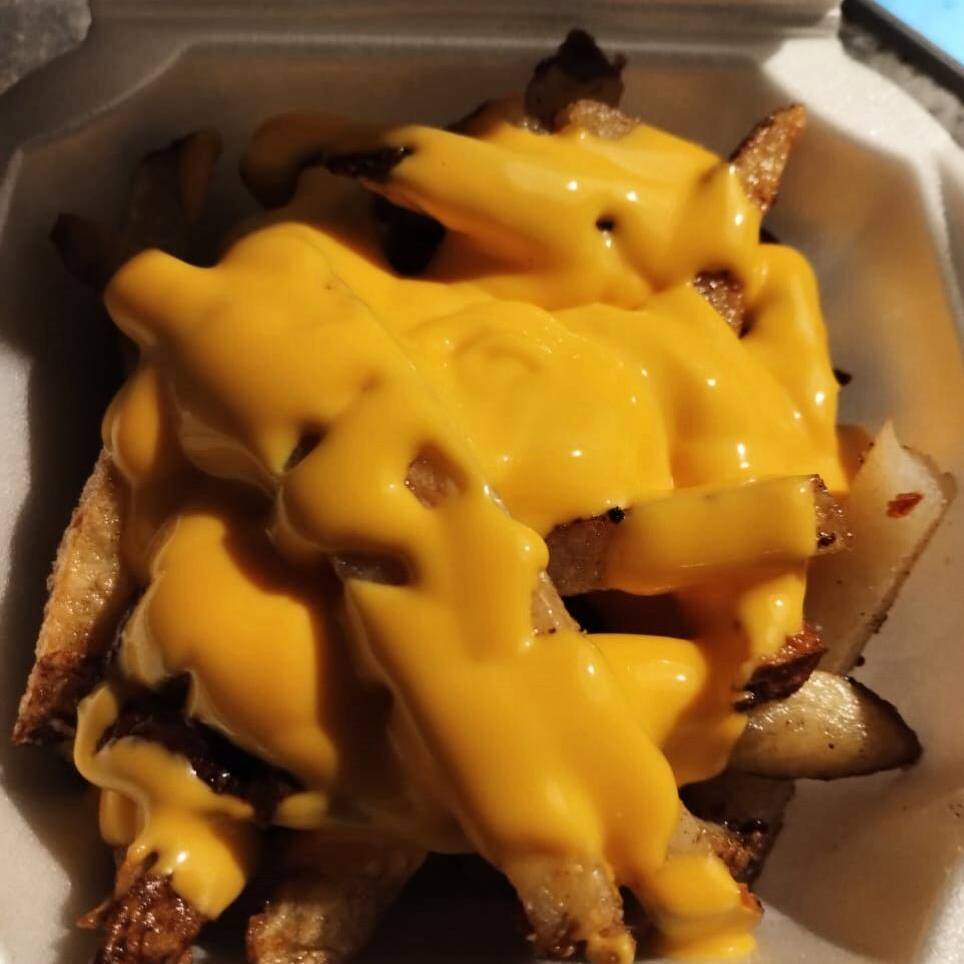 Papas con queso de nachos