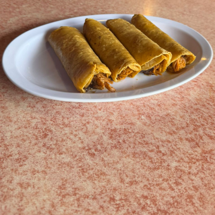 Orden de 4 Tacos de Cochinita