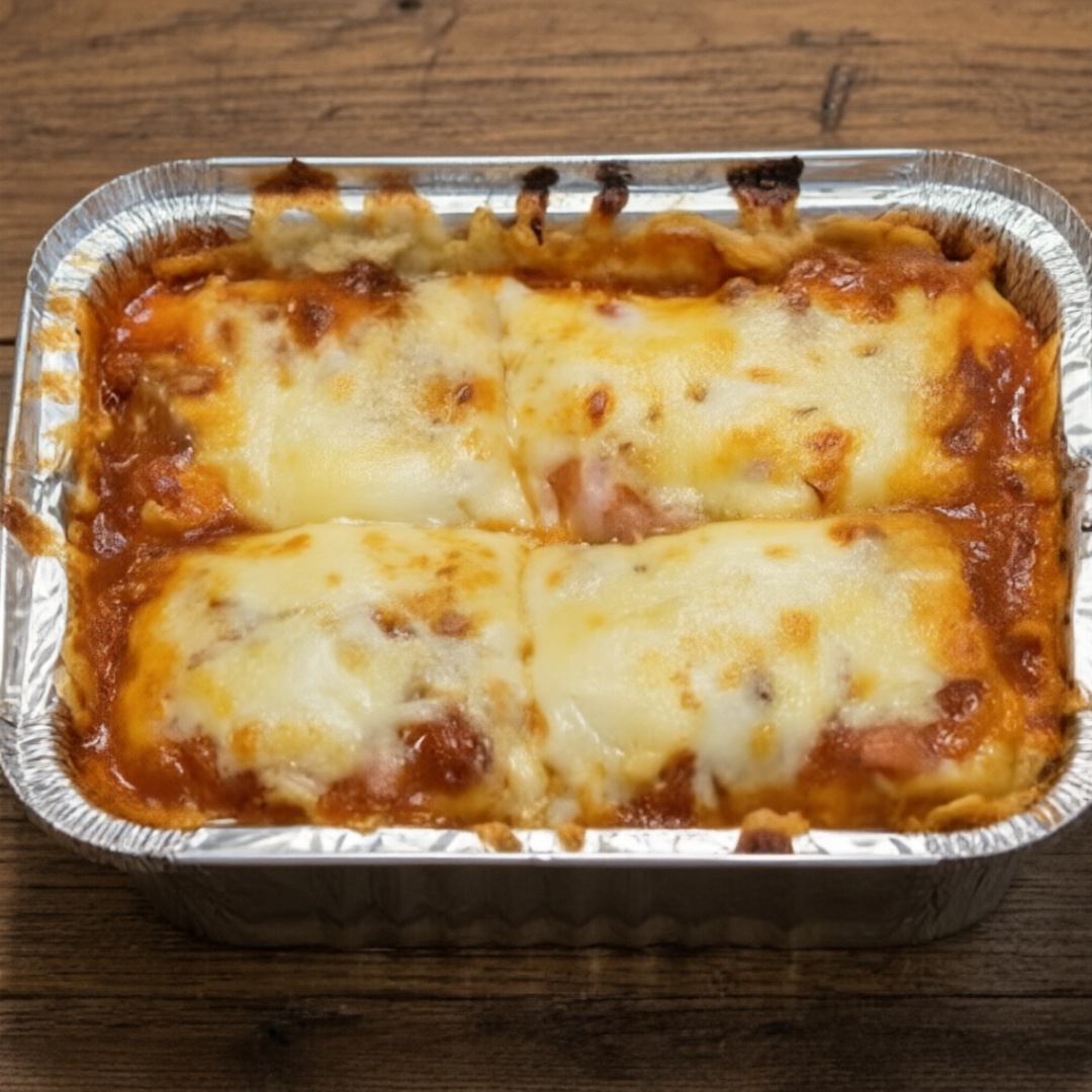 (Peso total -+ 1kg) 3 camadas de massa de lasanha, presunto,mussarela e molho a bolonhesa.