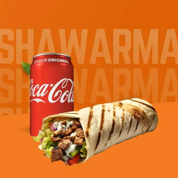 Delicie-se com nosso Combo de Shawarma de Carne, perfeitamente elaborado para uma refeição completa e saborosa. Inclui 1 irresistíveil Shawarmas de carne, preparados com carne suculenta e temperos exóticos, acompanhados de 1 refrescante Coca-Cola de 350 ml. Este combo é a escolha ideal para quem busca uma refeição repleta de sabor e autenticidade. Aproveite este verdadeiro banquete para você matar a sua fome de Shawarma!