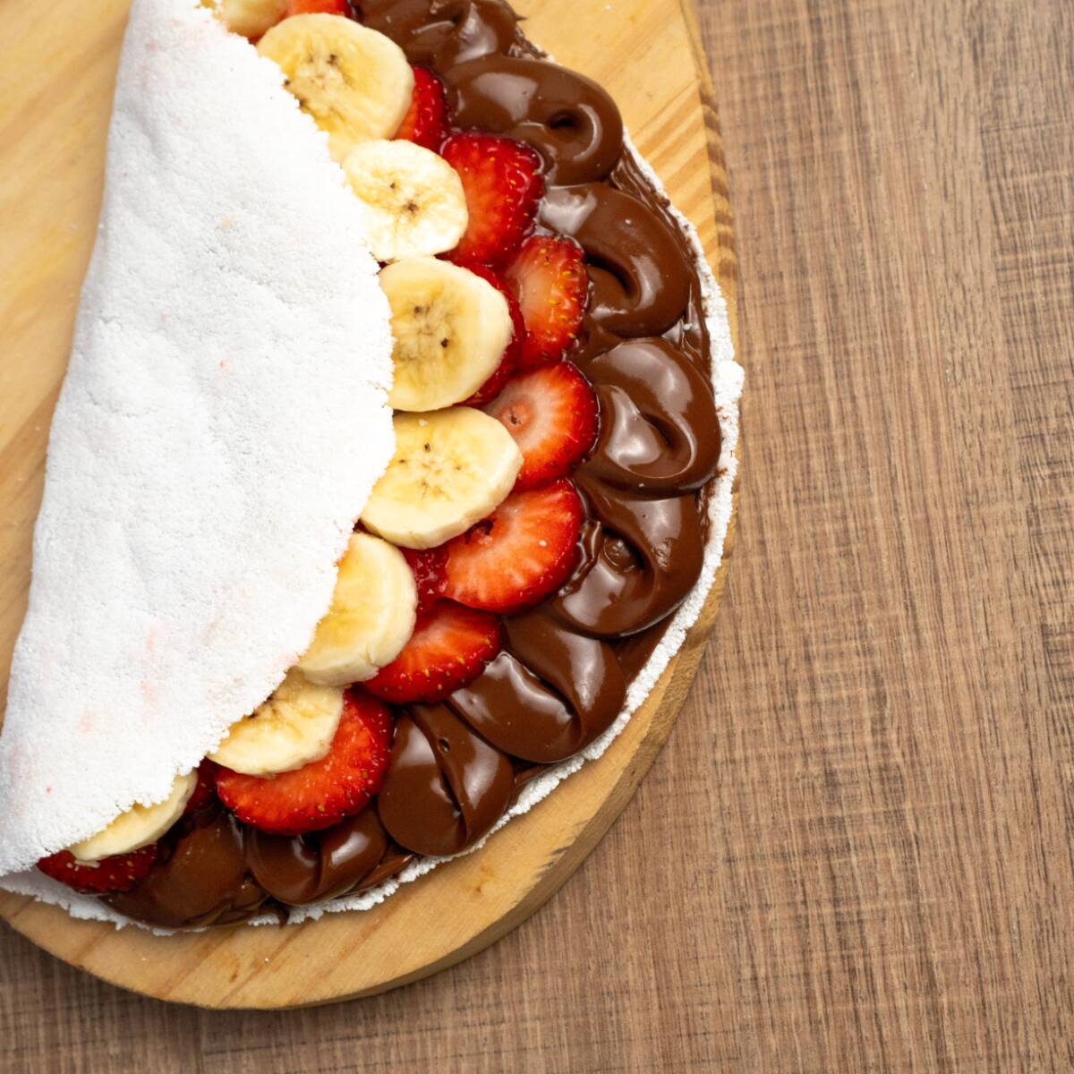 🥥✨ Tapioca Doce Super Recheada ✨🍫 Nossa tapioca é macia e saborosa, recheada generosamente com o sabor que você escolher. Escolha seu recheio favorito e se delicie com uma experiência doce, cremosa e irresistível a cada mordida! 😍