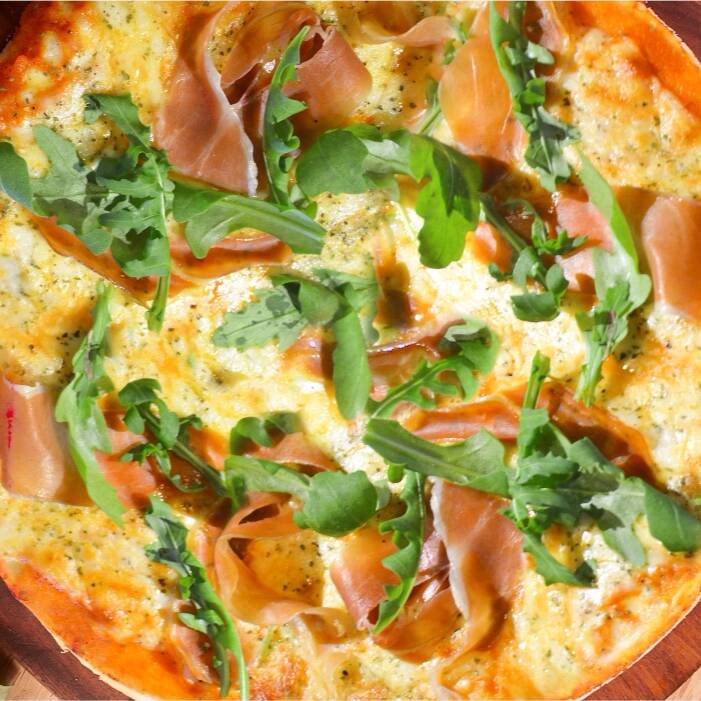 Pizza Prosciutto y Arúgula Mediana