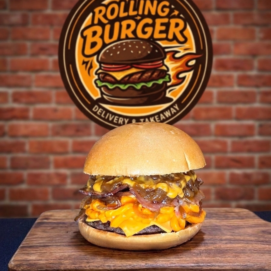 O encontro perfeito de texturas! Nosso suculento hambúrguer 100% bovino de 120g é mergulhado em uma generosa camada de cheddar cremoso, acompanhado por fatias de bacon super crocantes. O toque final fica por conta da nossa cebola caramelizada artesanal e o molho barbecue defumado. Tudo isso em um pão macio e selado na chapa.