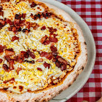 MOLHO, MUÇARELA, BACON, OVOS , AZEITONA E ORÉGANO.