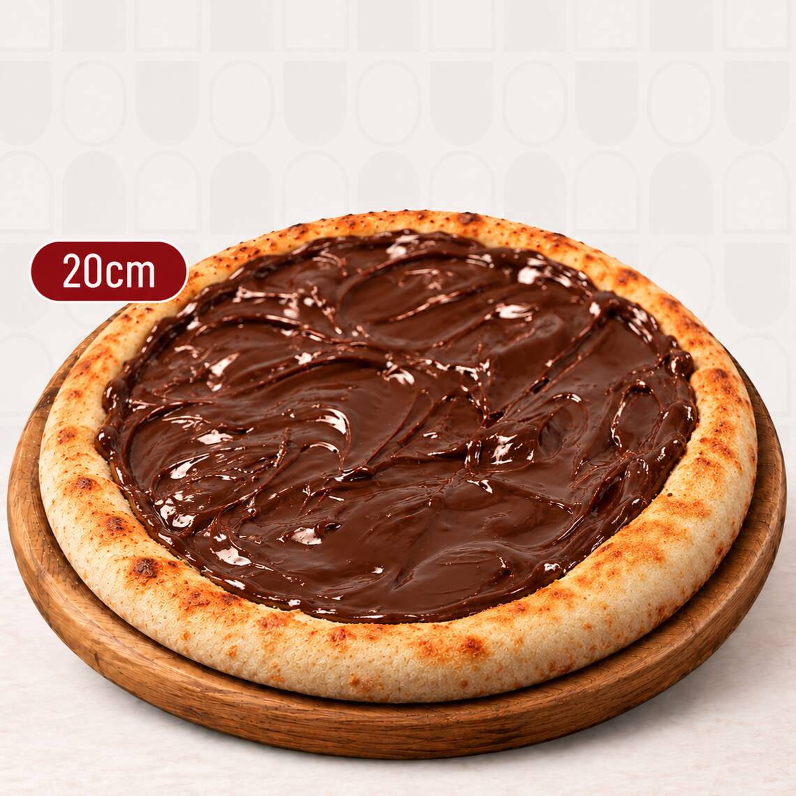 Ideal para matar aquela vontade de pizza, rápida e na medida! Pizza brotinho (20cm) sabor chocolate ao leite. Massa leve, de longa fermentação, assada com uma fina camada de creme de leite, coberta com porções generosas de chocolate ao leite derretido. Para preservar a integridade dos ingredientes, a pizza brotinho não vai cortada.