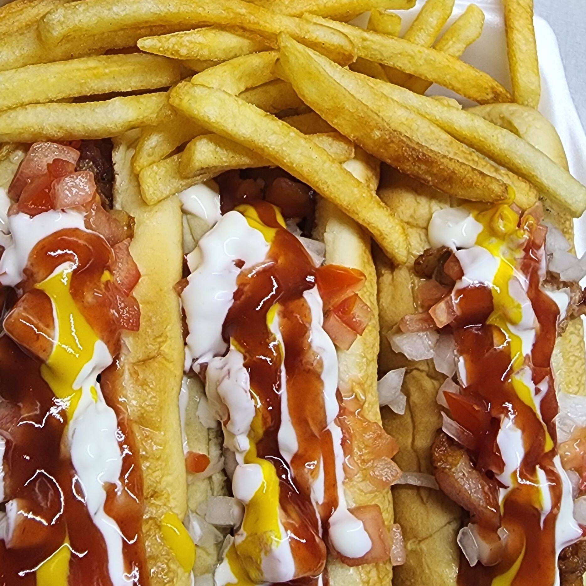 3 Hotdogs papas y bebida